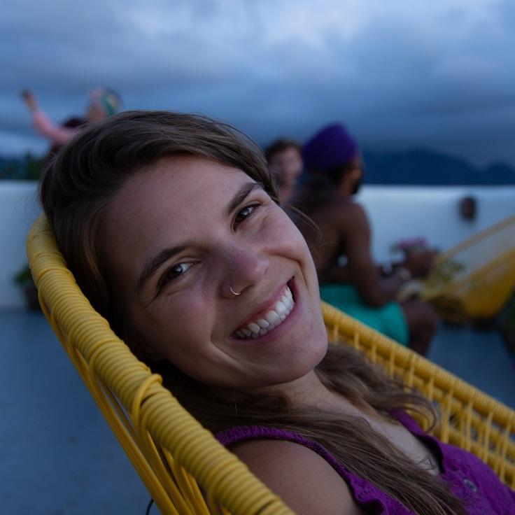 Kaveri Mehta, Lead Design Curator at CornerFuzzyPulse, reviewing corporate floral arrangements